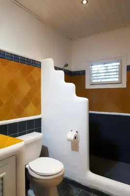 a bathroom with a toilet and a sink at Condo Hotel Playa Las Ballenas in Las Terrenas
