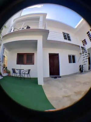 a round view of a house with a table and chairs at Villa Kate in Las Terrenas