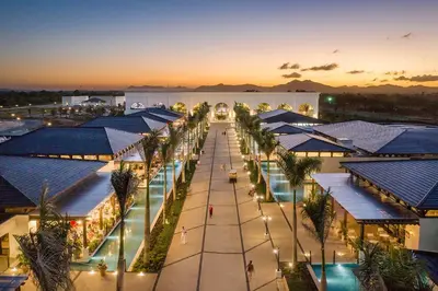 an aerial view of a city with buildings and palm trees at El Beso Adults Only At Ocean El Faro - All Inclusive in Punta Cana