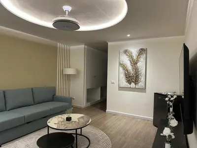 a living room with a couch and a table at Soficu Hotel El Edén Dominicus in Bayahibe