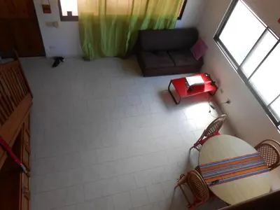 an overhead view of a living room with a couch at 22 plaza rosada in Las Terrenas