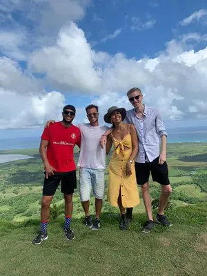 a group of people standing on top of a hill at Hostel Eco Punta Cana in Punta Cana