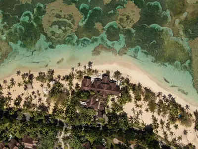 an aerial view of a resort on a beach at Balcones Beach Penthouse in Las Terrenas