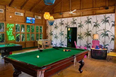 a billiard room with a pool table at Tropical Deluxe Princess - All Inclusive in Punta Cana
