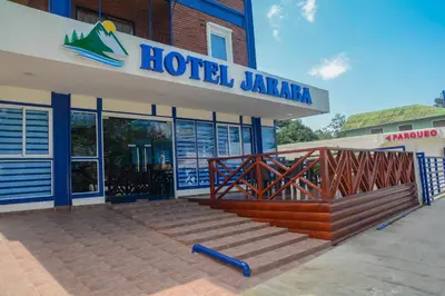 a hotel jamaica building with a sign on it at Hotel Jaraba in Jarabacoa