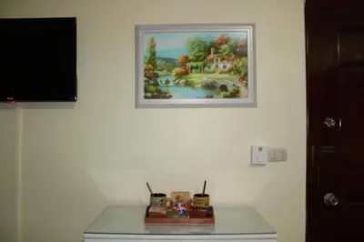 a picture of a painting hanging on a wall at Apartamento B6 El Dorado en Bávaro - Punta Cana in Punta Cana