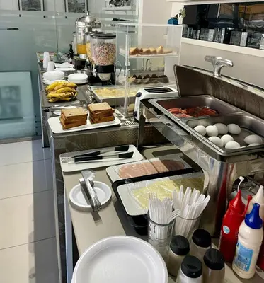 a kitchen with some food on a counter at City Caribbean Hotel Boutique in Santo Domingo