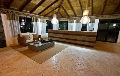 a living room with a couch and a coffee table at El Morro Eco Adventure Hotel in San Fernando de Monte Cristi
