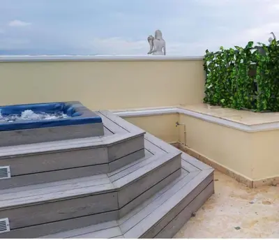 a room with stairs and an elephant statue on a wall at Elegant apartment with Jacuzzi in Boca Chica - 200 m² in Boca Chica
