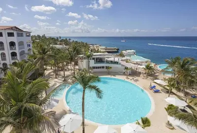 an aerial view of a resort with a swimming pool at Espectacular Apartamento con Vista al Mar Solo Adultos in La Laguna