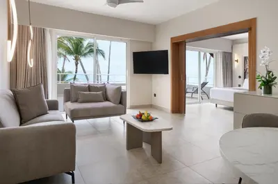 a living room with a couch and a table at Breathless Punta Cana Resort & Spa - Adults Only - All Inclusive in Punta Cana