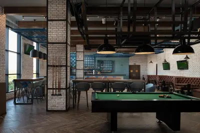 a billiard room with a pool table and a bar at Dreams Macao Beach Punta Cana - All Inclusive in Punta Cana