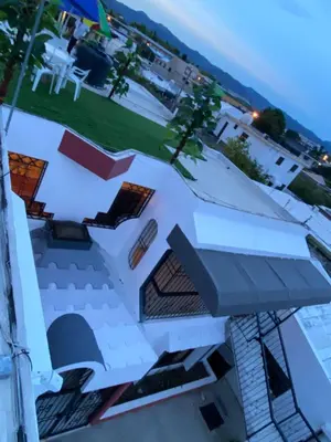 a view from the roof of a house at 6-1 SANTIAGO CITY GREAT COZY APT TO STAY - Cozy 3 bedrooms Apartment for 7 peoples - close to all kind the business wifi - Air Condition in Santiago de los Caballeros