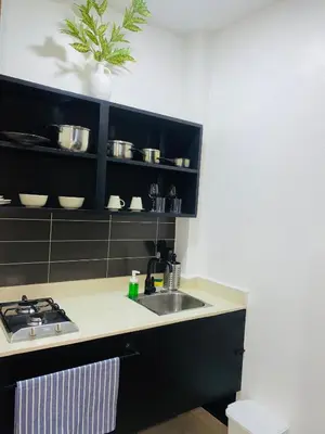 a kitchen with a sink and a counter top at Ocean Breeze Studios in Santo Domingo