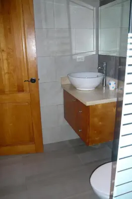 a bathroom with a sink and a mirror at The blue lagoon of the Caribbean Sea. Velero 205.Cadaques Caribe in La Fragata