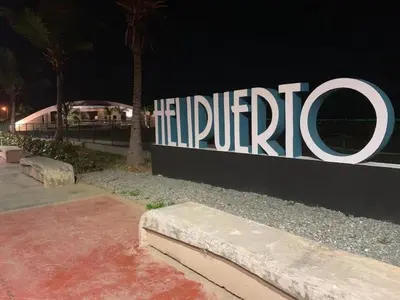 a large sign that says hiltirride on a wall at Malecon Cozy Private Room 6 in Santo Domingo