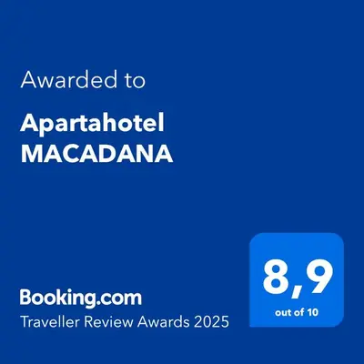 a blue text box with the words upgraded to apartheid macdonald maccallan at Apartahotel MACADANA in Nagua