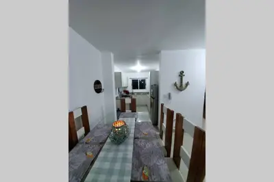 a dining room with a table and chairs at Hanly Roger's Brand new place in San Felipe de Puerto Plata