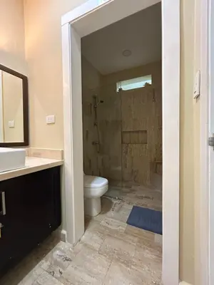 a bathroom with a shower and a toilet and a sink at Best ocean view Sosua-Cabarete in Sosúa