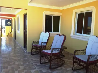 a group of chairs sitting in a hallway at Quiet 1 Bedroom Apartment Premium Wi-Fi 2 beds 15 minutes from the airport in La Viva