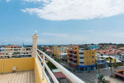 a view of a city from a balcony at Modern Tropical 2-Bedroom Apartment with Terrace 300 Mbps Wi-Fi, power Generator in La Viva