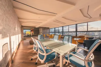 a conference room with a table and chairs at Fully Serviced Apartment at Regatta Living - 2C in Santo Domingo