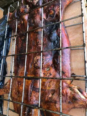 a grill with a piece of meat on it at VILLA CAMPESTRE EN LOMAS LINDA in Villa Altagracia