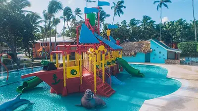 a pool with a water park with a playground at Iberostar Selection Bavaro Suites - All Inclusive in Punta Cana
