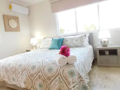 a bedroom with a bed with two towels on it at Beach Residence | Escapada Penthouse Vista Mar in Punta Cana