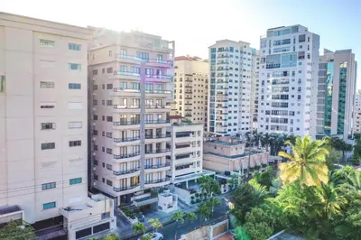 an aerial view of a city with tall buildings at Fully Serviced Apartment at Regatta Living II - 907 in Santo Domingo