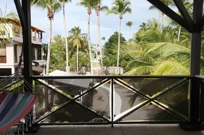 a view from the balcony of a resort with palm trees at Chaykovski Boutique H in Las Terrenas