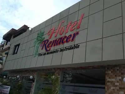 a hotel ranger sign on the side of a building at Hotel Renacer in Santo Domingo