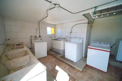 a kitchen with three washers and two washers at Double Room, Corales del SurOle Las Americas- Isabelita - Aeropuerto-Aeropuerto in La Viva