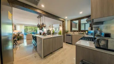 a large kitchen with a large island in a room at Special Price Deluxe 2BR at El Portillo in Las Terrenas