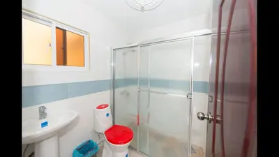a bathroom with a shower and a sink at 2 Bedroom 2 Bathroom Apartment- Corales del Sur Ole Las Americas- Isabelita in La Viva