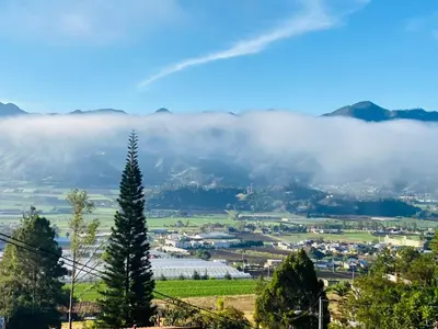 a view of a valley in the clouds at Villa Paloma/ Home/ Office-Remote Office in Constanza