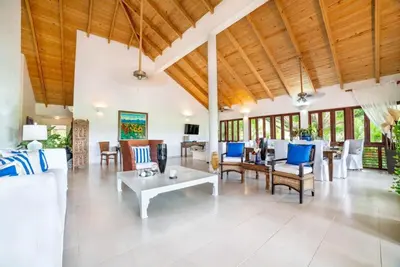 an open living room with a lot of furniture at Los Lagos 19 - Sleeps 10 - Butler - Pool Hot Tub in La Romana