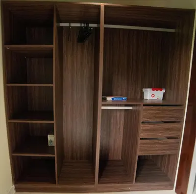 a wooden closet with wooden shelves in a room at Villa segur-a vicente in Concepción de La Vega