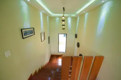 a hallway with stairs and a window in a building at Villa segur-a vicente in Concepción de La Vega