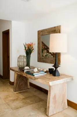a table with a mirror and a lamp on it at Ocean View Villa/Luxury Puerto Bahia Resort/Samaná in Santa Bárbara de Samaná