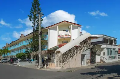 a building with a slide on the side of it at Apartamentos in Condo Plaza Europa in Sosúa