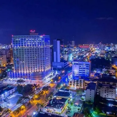 a view of a city at night with lights at Dom. Rep. Exclusive 2 bed Apt. Evaristo Morales in Santo Domingo
