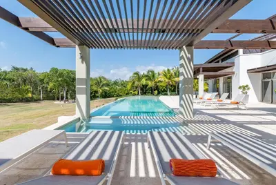an image of a swimming pool in a house at Casa de Campo Luxury Villas - Private Paradise at La Romana in La Romana