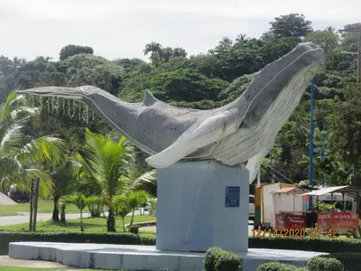 a statue of a whale on display in a park at Pelicano Tropical Paraiso Samana in Santa Bárbara de Samaná