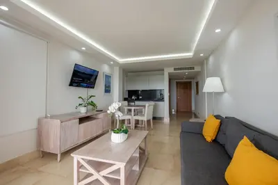 a living room with a couch and a table at Hacienda Samana Bay Hotel in Santa Bárbara de Samaná