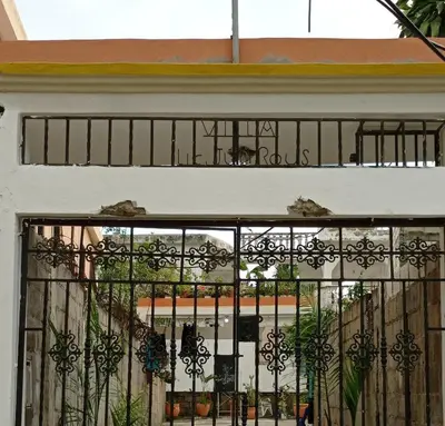an iron gate on the front of a building at Villa Julirous Rd-spa and ApartHotel, Camp for vacationers, 2 bedrooms in Boca Chica