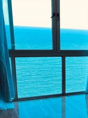 a view of the ocean from a window at Malecón vista mar Habitación Privada Larimar, in Santo Domingo