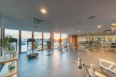 a gym with a lot of treadmills and machines at Villa with 3 bedrooms private pool and ocean view in Santa Bárbara de Samaná