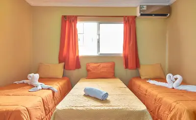 a room with two beds with stuffed animals on them at Spacious 2Br 1Bath Apartment Terrace & Street View in La Viva
