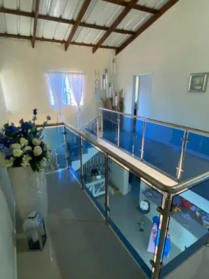 a view of a tennis court with a glass floor at Villa La Grande in Jarabacoa